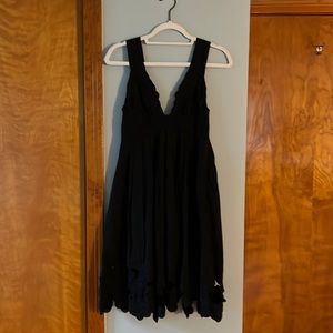 Beautiful black dress with empire waist, embroidered flowers and cut outs